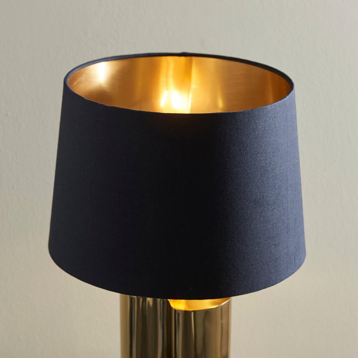 Gold fashion table lamp with black shade